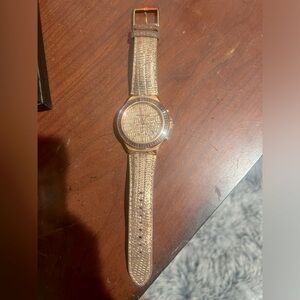 Michael Kors woman’s rose gold watch… good condition … is used… needs a battery